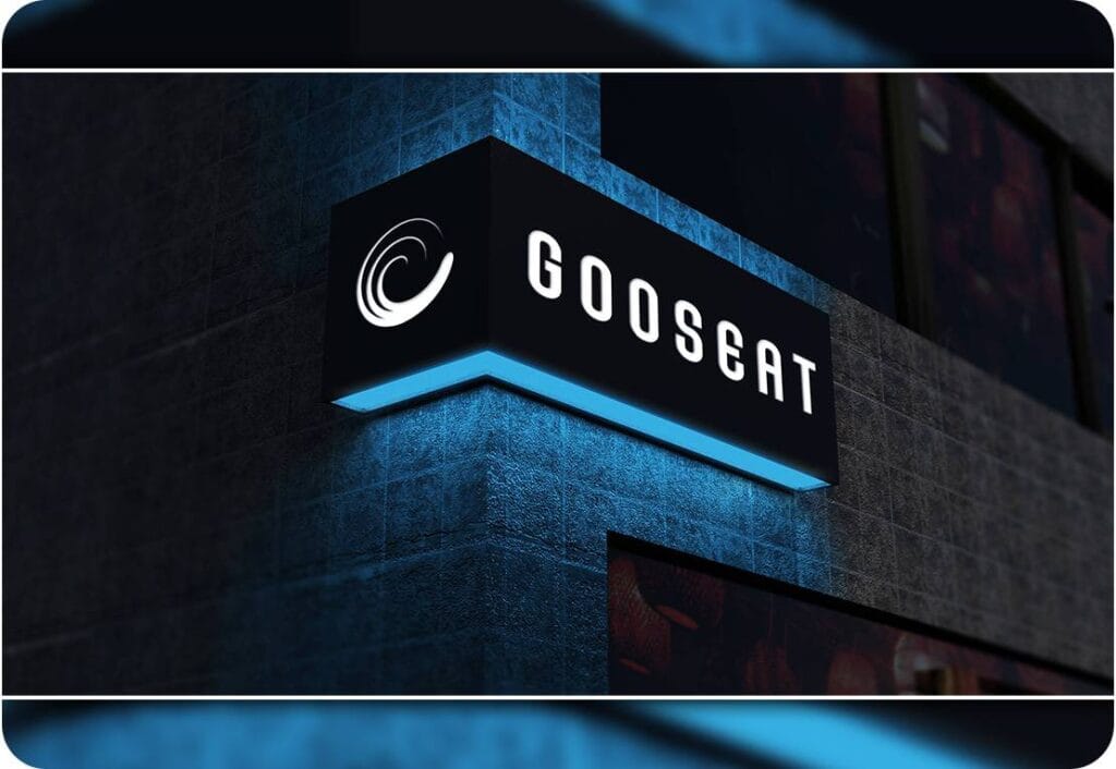 PSD Signage Logo Mockup on Corner Facade or Storefront with Night Lighting 21647763